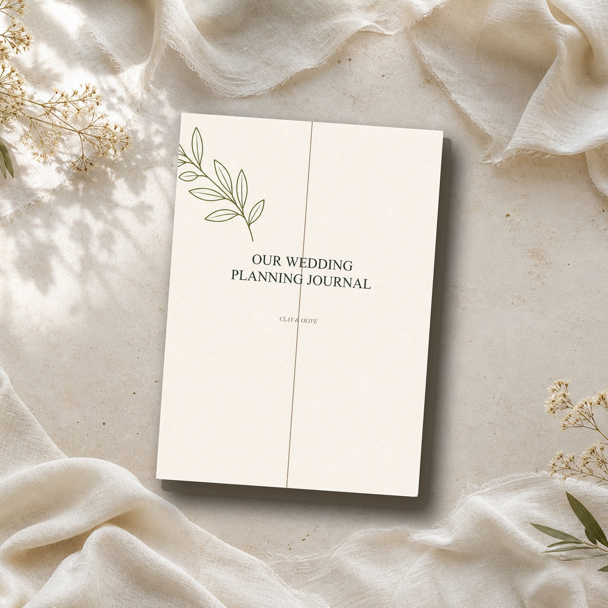 Clay & Olive wedding planning journal with coordinated botanical wedding stationery cover