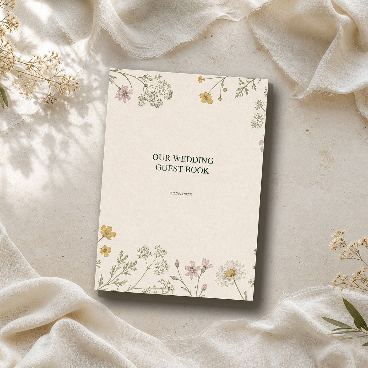 Wildflower wedding guest book with coordinated botanical wedding stationery cover